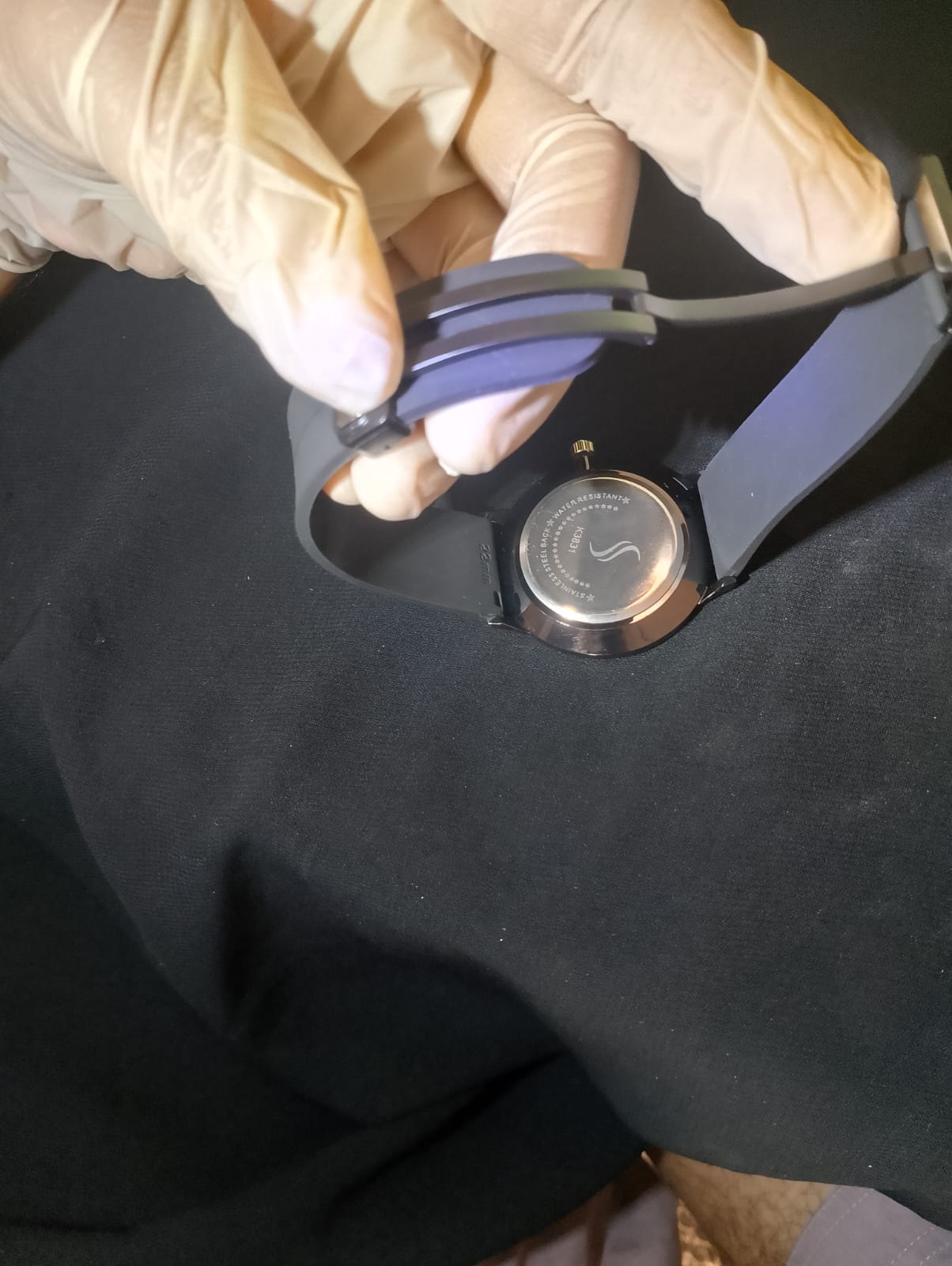 Stylish timepiece with a black case, a black dial, and a black strap.