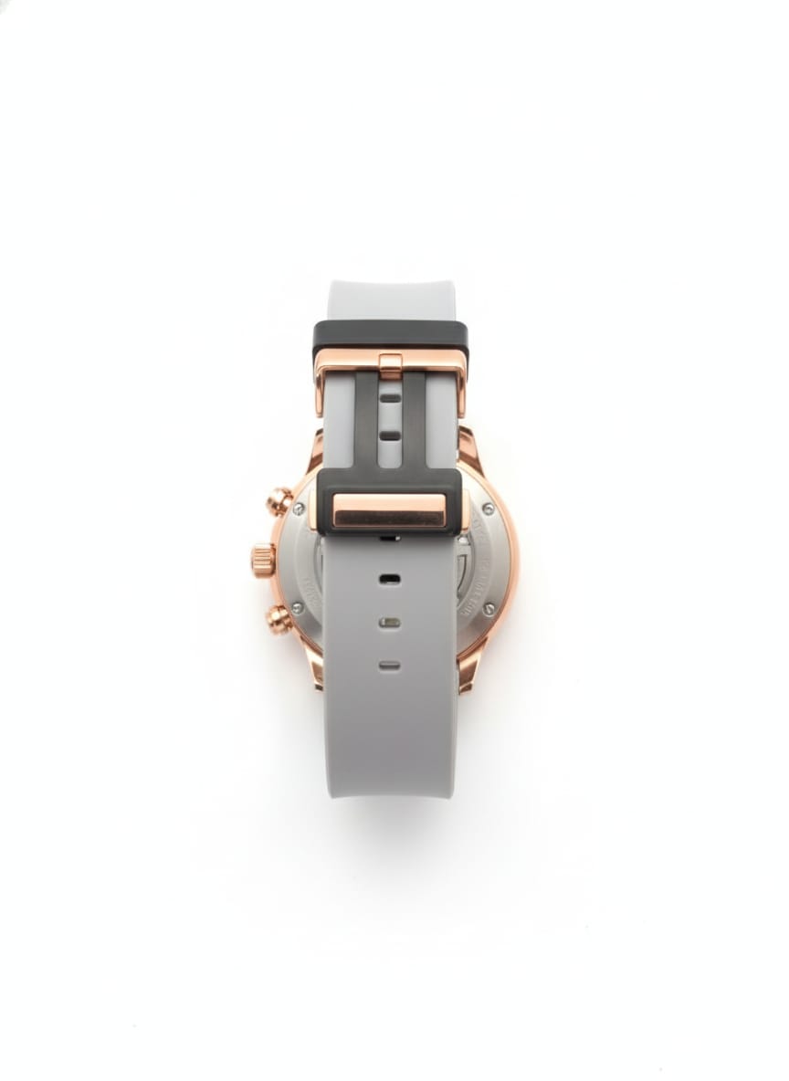 Stylish timepiece with a rose gold case, a white dial, and a grey strap.